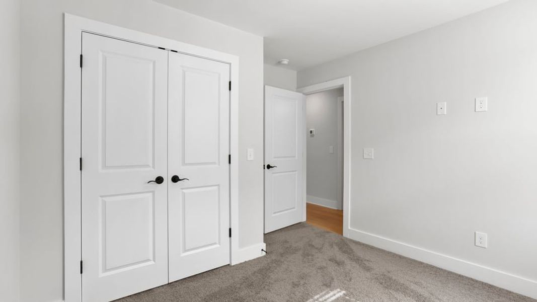 Representative unfurnished interior of a home built from the Bakersfield by D.R. Horton in Edgewood Estates, Greenville (Image 29).