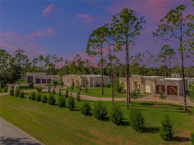 Main residence, 2nd residence and garage with RV garage