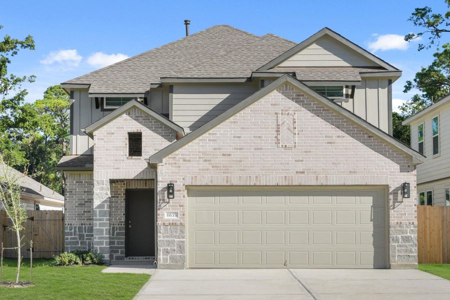 Front exterior of a new home in Cypresswood Landing, Humble, TX, highlighting curb appeal (Image 2).