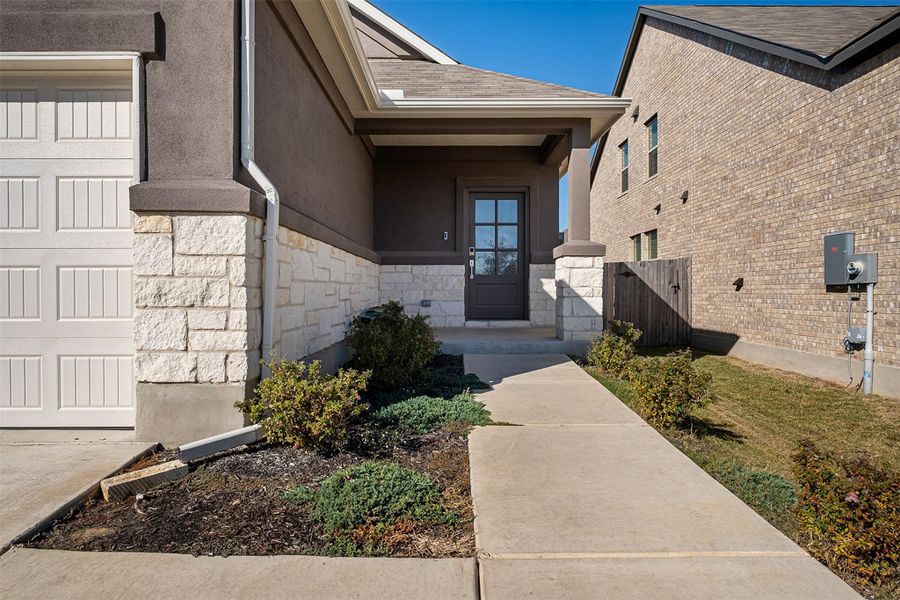 Exterior details and patio area of a home in Sunfield, Buda (Image 4).