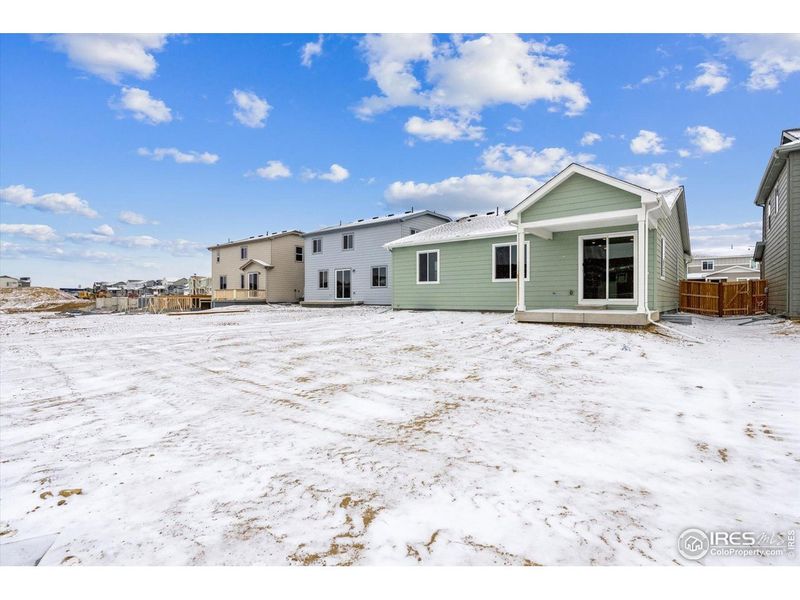 Exterior details and patio area of a home in The Overlook at Johnstown Farms, Johnstown (Image 21).
