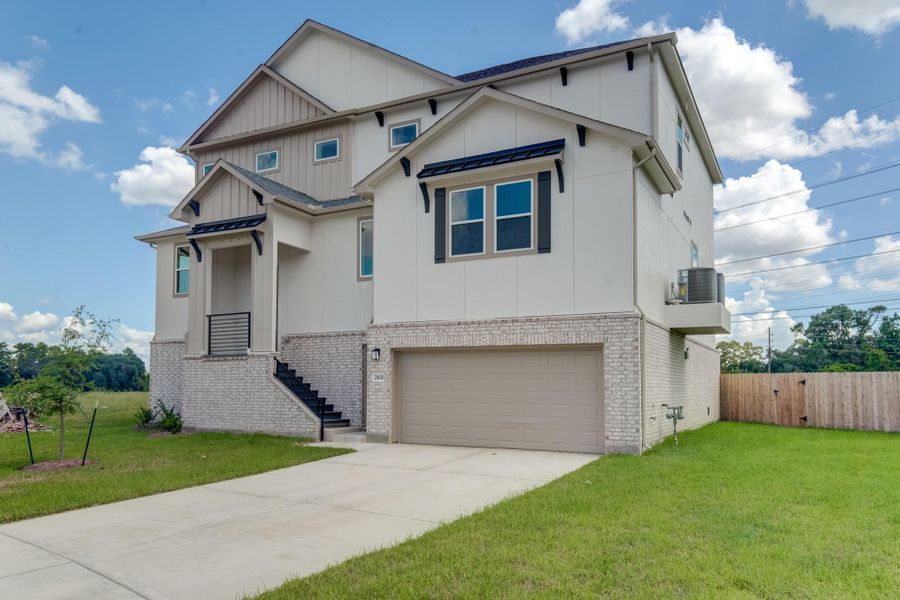 Front exterior of a new home in Townsen Landing, Humble, TX, highlighting curb appeal (Image 12).
