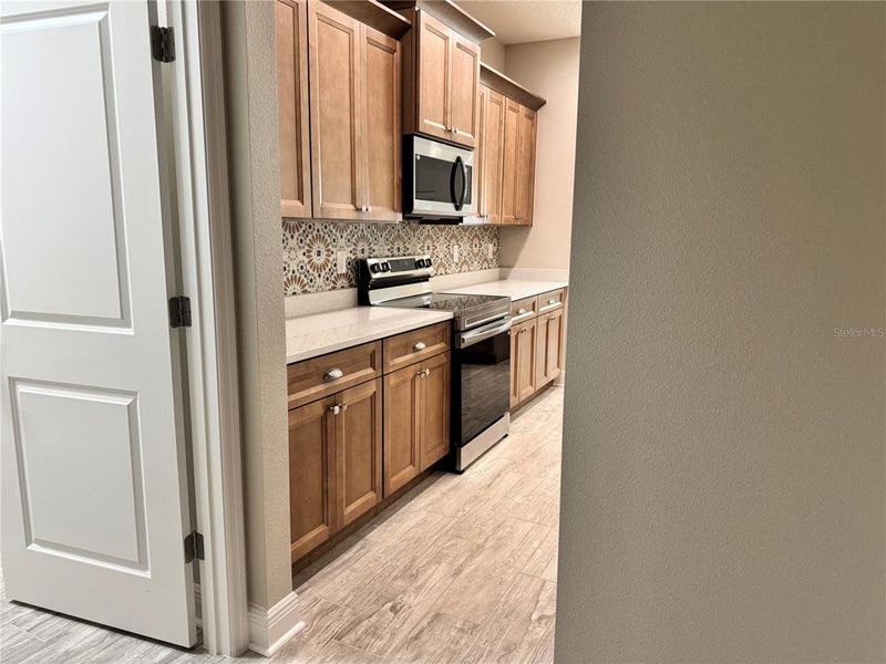 Furnished interior view inside a new home in , Dade City (Image 9).