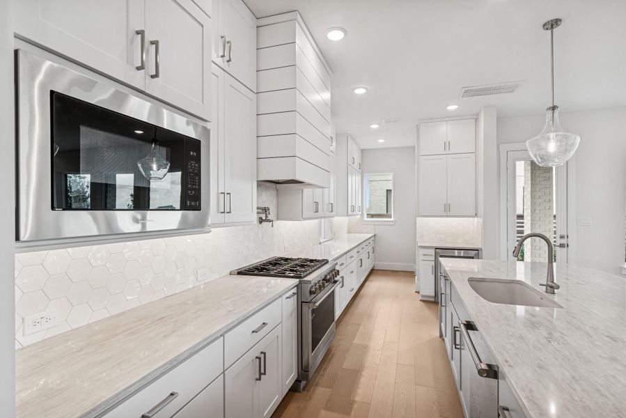 Furnished interior view inside a new home in Easthaven at Bridgeland Central - Vision Collection, Cypress (Image 13). Furnished interior view inside a new home in Easthaven at Bridgeland Central - Vision Collection, Cypress (Image 13).