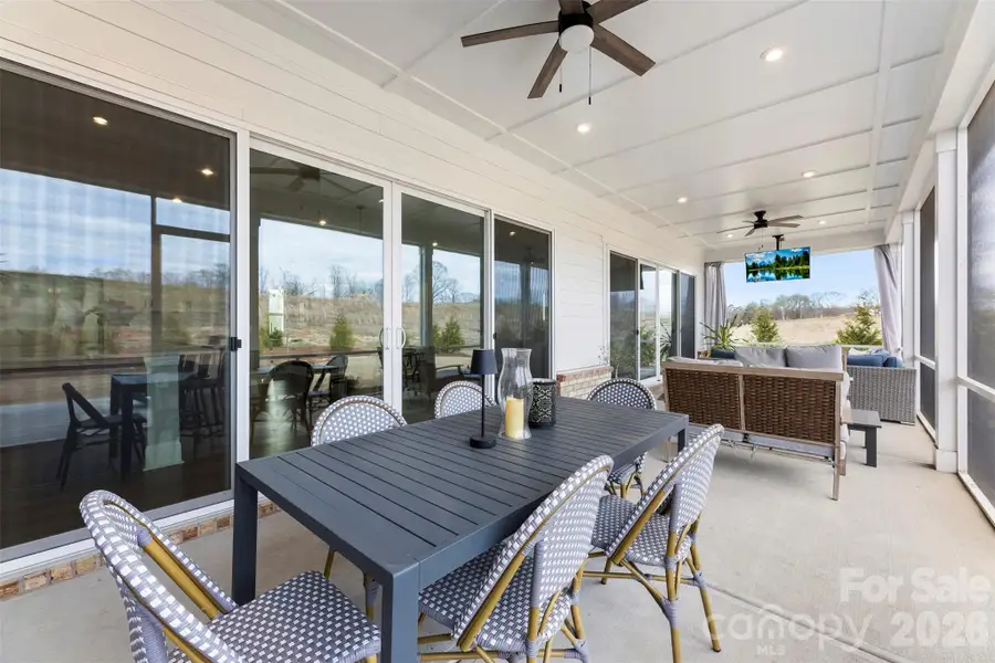 Exterior details and patio area of a home in , Belmont (Image 4).