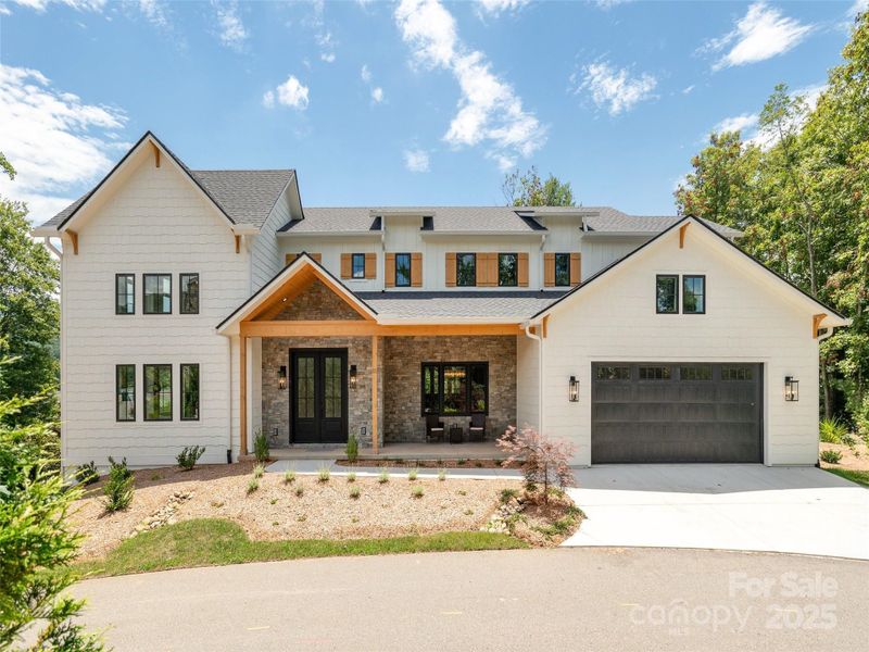 Front exterior of a new home in , Asheville, NC, highlighting curb appeal (Image 25).