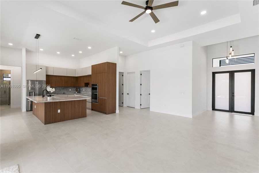 High-end finishes include MATTE PORCELAIN TILE throughout, IMPACT-RESISTANT Low-E windows & doors, BAHAMA SHUTTERS & a welcoming COLUMNED FRONT PORCH w/ frosted DOUBLE ENTRY DOORS. High-end finishes include MATTE PORCELAIN TILE throughout, IMPACT-RESISTANT Low-E windows & doors, BAHAMA SHUTTERS & a welcoming COLUMNED FRONT PORCH w/ frosted DOUBLE ENTRY DOORS.