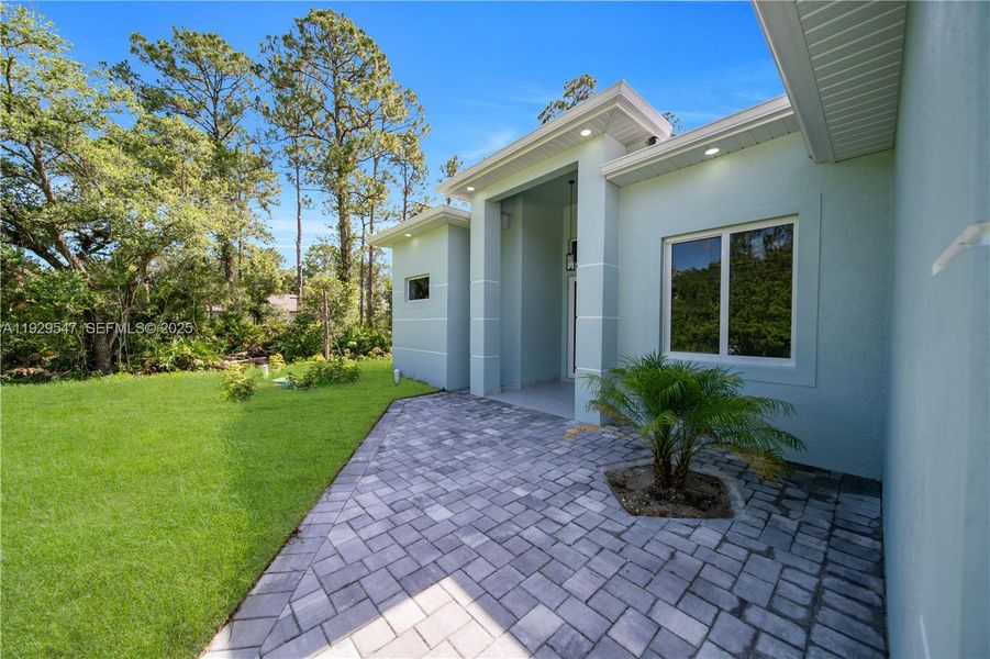 Exterior details and patio area of a home in , Lehigh Acres (Image 24). Exterior details and patio area of a home in , Lehigh Acres (Image 24).
