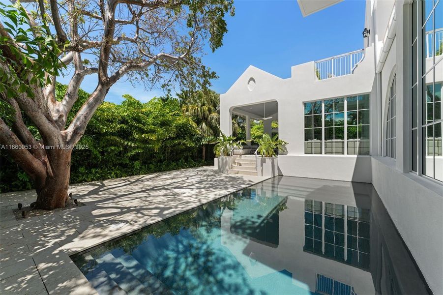 Front exterior of a new home in , Key Biscayne, FL, highlighting curb appeal (Image 27). Front exterior of a new home in , Key Biscayne, FL, highlighting curb appeal (Image 27).