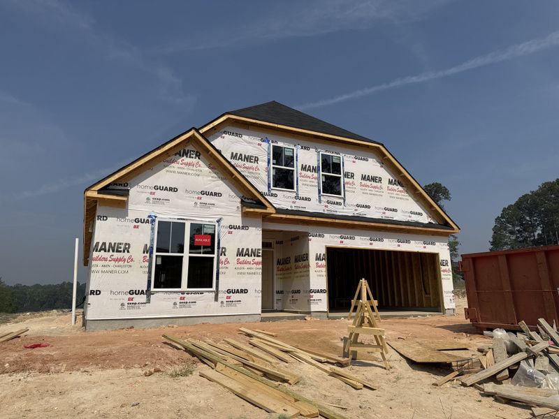 Front exterior of a new home in Forrest Bluff, North Augusta, SC, highlighting curb appeal (Image 1). Front exterior of a new home in Forrest Bluff, North Augusta, SC, highlighting curb appeal (Image 1).
