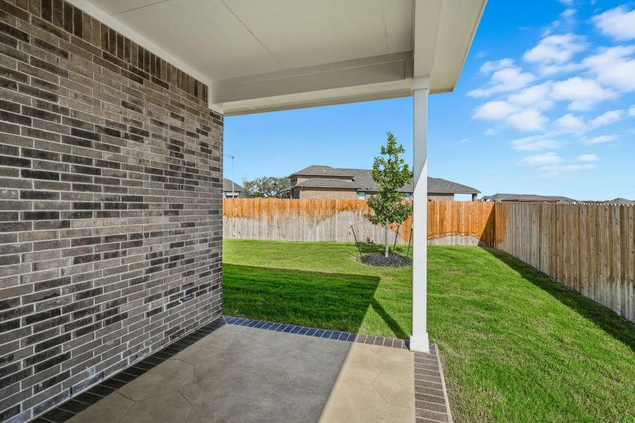 Exterior details and patio area of a home in Alsatian Oaks, Castroville (Image 26).