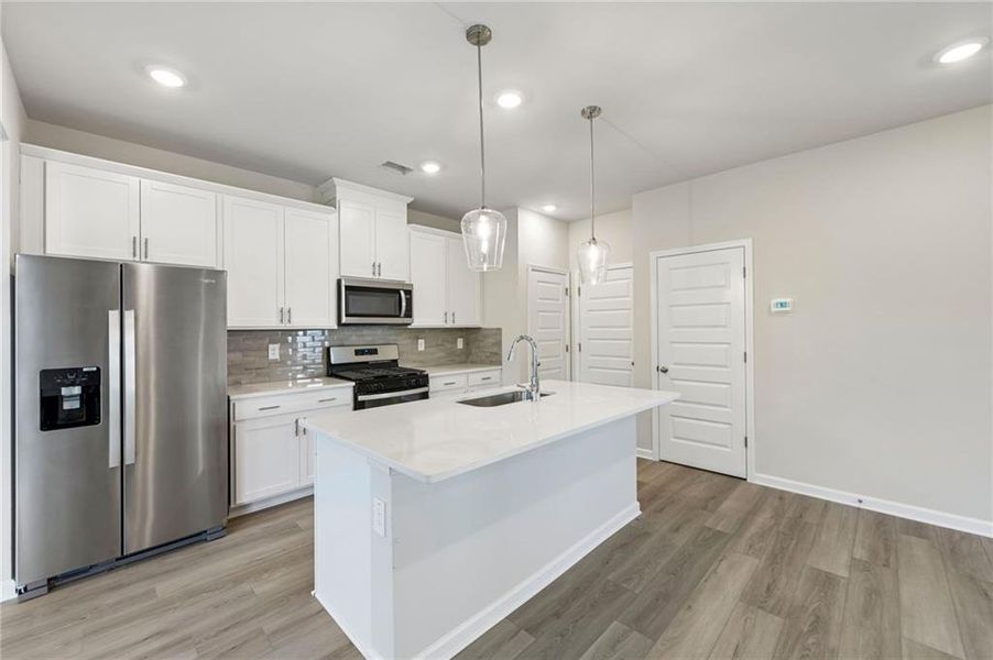Furnished interior view inside a new home in Hemingway - Reserve Series, Cumming (Image 6). Furnished interior view inside a new home in Hemingway - Reserve Series, Cumming (Image 6).