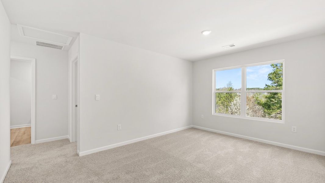 Representative unfurnished interior of a home built from the Hayden by D.R. Horton in Liberty Crossing, Braselton (Image 25).