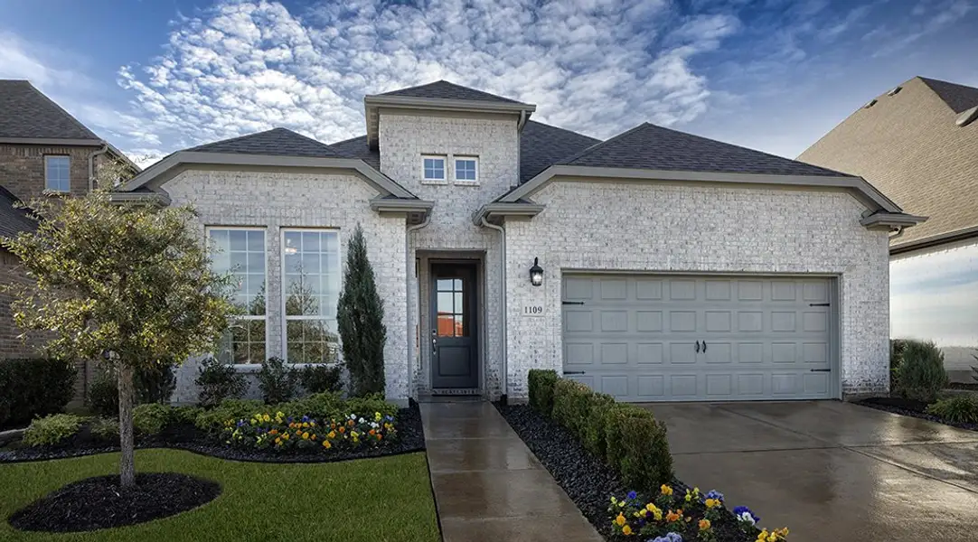 Front exterior of a new home in The Ridge at Northlake, Northlake, TX, highlighting curb appeal (Image 2). Front exterior of a new home in The Ridge at Northlake, Northlake, TX, highlighting curb appeal (Image 2).