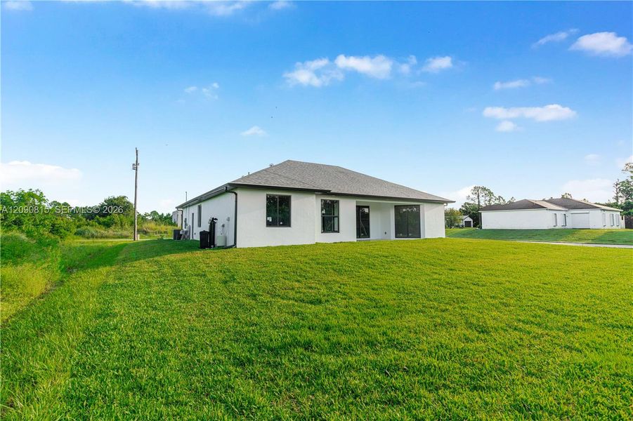 Exterior details and patio area of a home in , Lehigh Acres (Image 3).