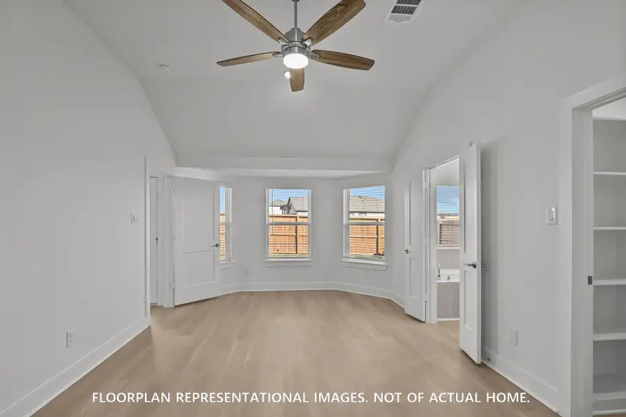 Spacious, unfurnished interior of a new home in Pinewood at Grand Texas, New Caney (Image 9).