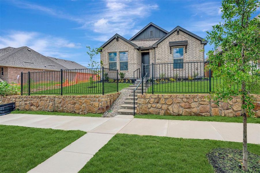Front exterior of a new home in Lilybrooke at Legacy Hills, Celina, TX, highlighting curb appeal (Image 25). Front exterior of a new home in Lilybrooke at Legacy Hills, Celina, TX, highlighting curb appeal (Image 25).