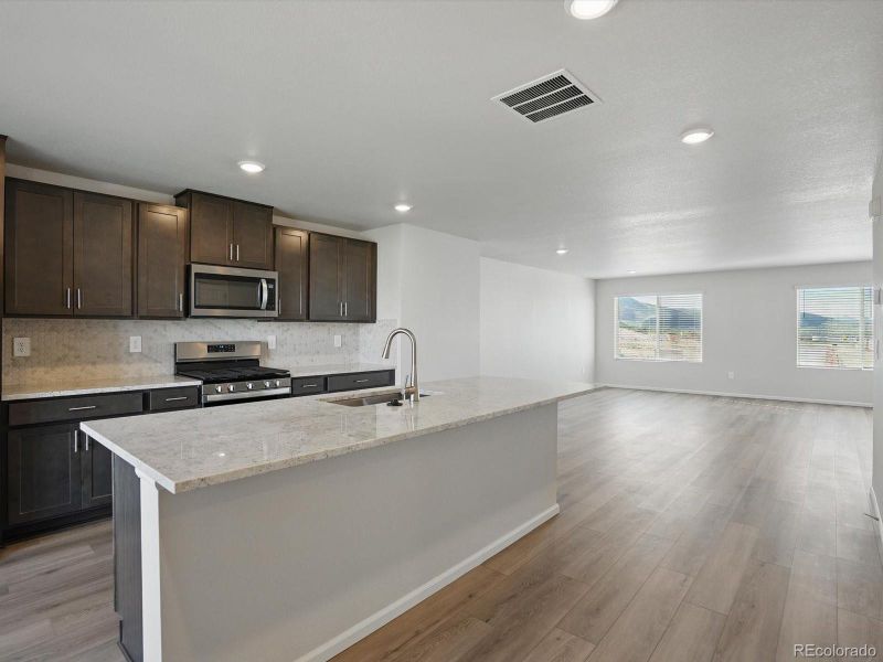 Furnished interior view inside a new home in Three Hills, Morrison (Image 8).