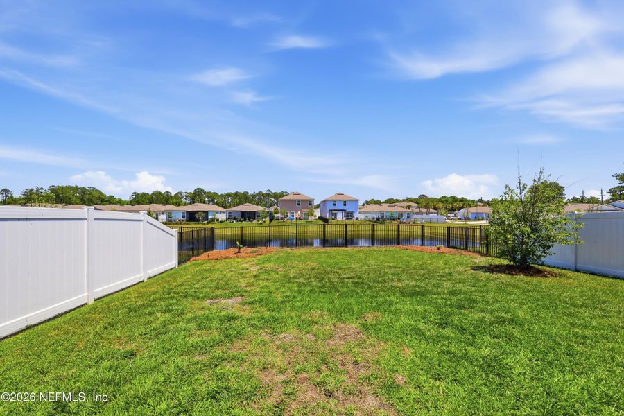 Exterior details and patio area of a home in Ravenswood Village, St. Augustine (Image 24).