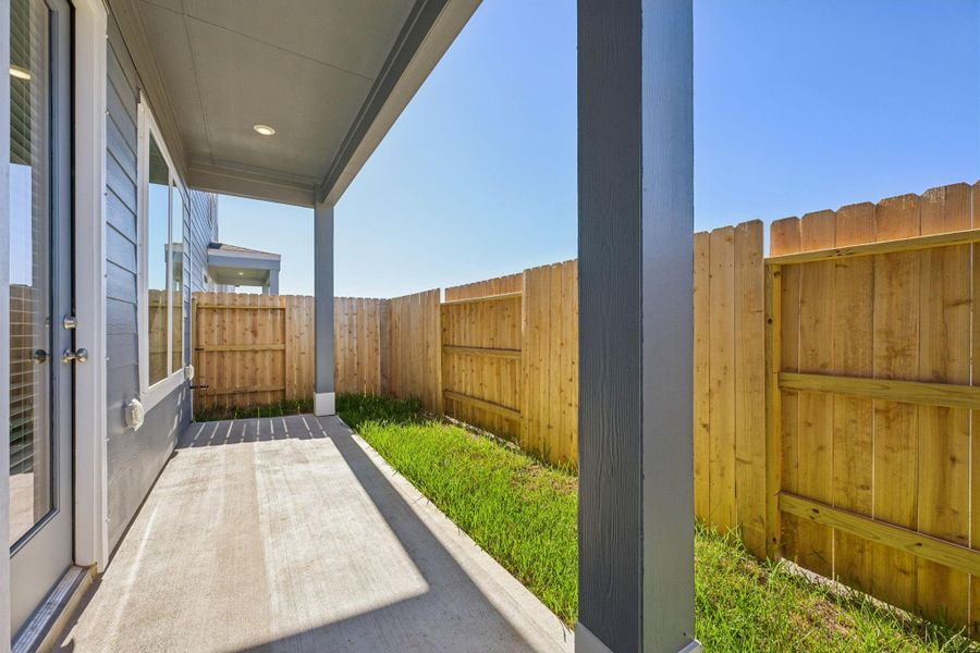 Exterior details and patio area of a home in Kemah Crossing - Luxe Series, Kemah (Image 4).