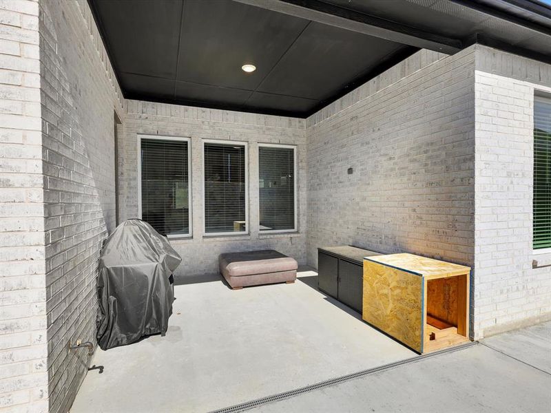 Exterior details and patio area of a home in Nelson Lake, Rockwall (Image 3). Exterior details and patio area of a home in Nelson Lake, Rockwall (Image 3).