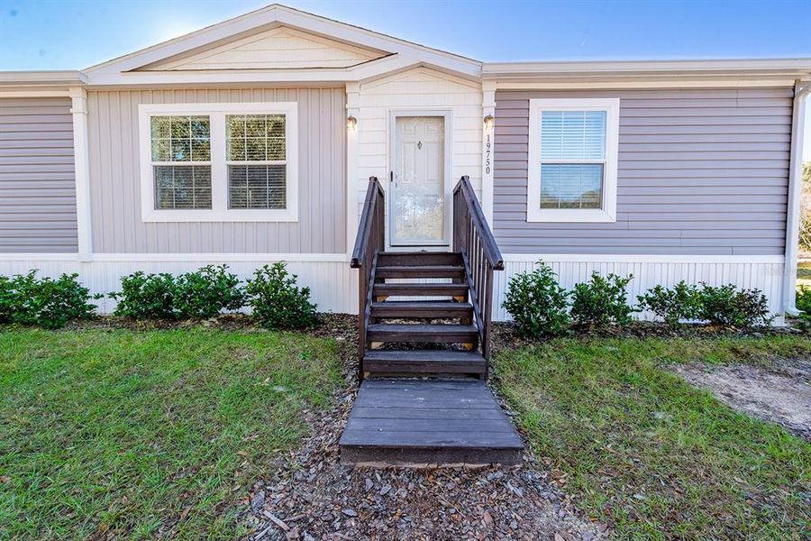Exterior details and patio area of a home in , Morriston (Image 24).