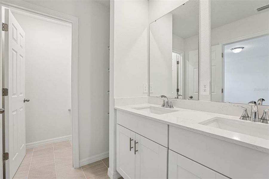 Furnished interior view inside a new home in Cagan Crossings West, Clermont (Image 11).