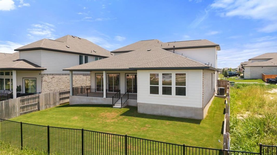 Exterior details and patio area of a home in Lariat, Liberty Hill (Image 4).