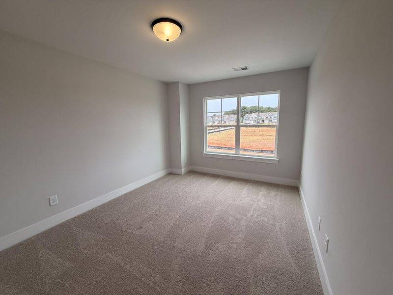 Spacious, unfurnished interior of a new home in Blythe Mill Townhomes, Waxhaw (Image 11).