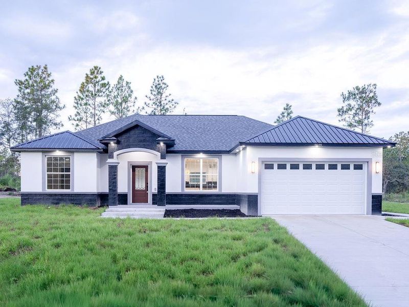 Front exterior of a new home in , Dunnellon, FL, highlighting curb appeal (Image 29). Front exterior of a new home in , Dunnellon, FL, highlighting curb appeal (Image 29).