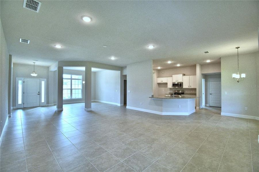 Spacious, unfurnished interior of a new home in Cadence Crossing, Auburndale (Image 61).