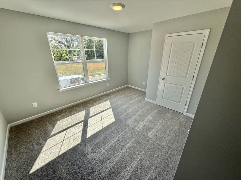 Spacious, unfurnished interior of a new home in Stonehenge, Manchester (Image 6).