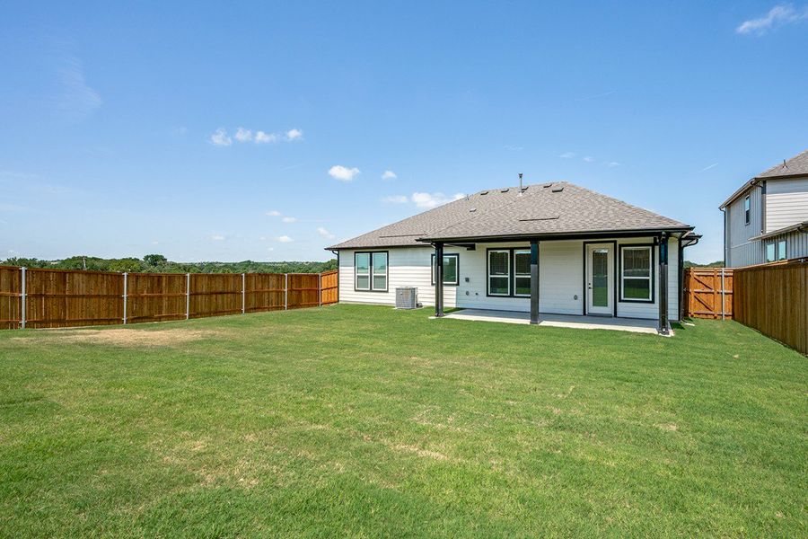 Front exterior of a new home in Sierra Vista at Kelly Ranch, Aledo, TX, highlighting curb appeal (Image 2).