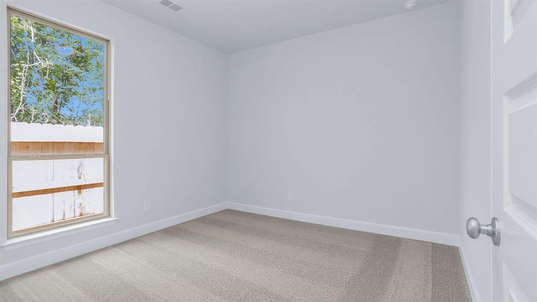 Spacious, unfurnished interior of a new home in Artavia 45', Conroe (Image 11).