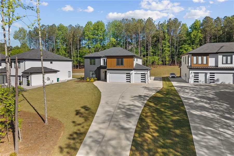 Front exterior of a new home in , Sugar Hill, GA, highlighting curb appeal (Image 27).