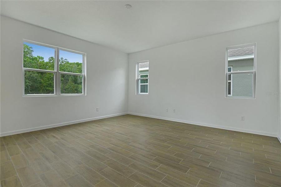 Spacious, unfurnished interior of a new home in Seasons at Aurora Oaks, Ocala (Image 13).
