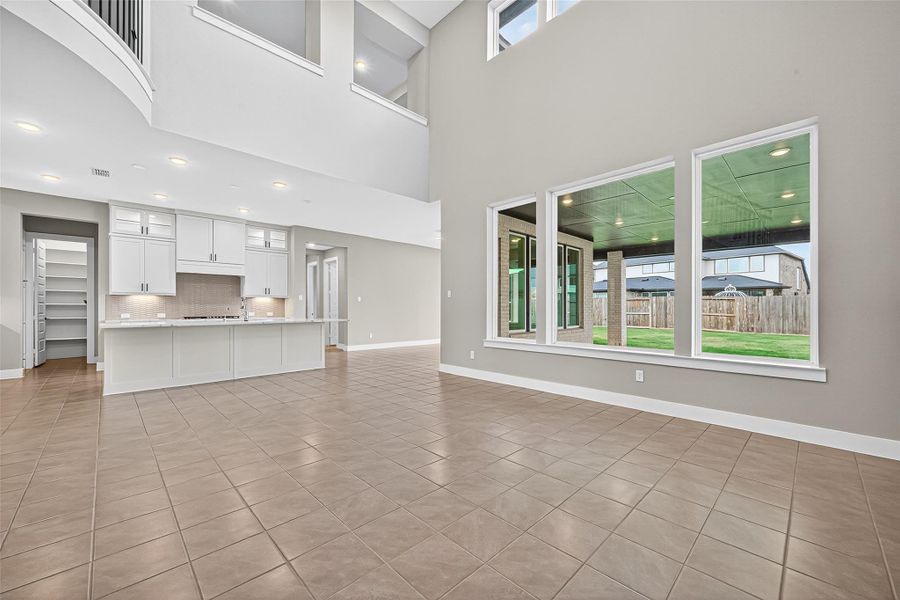 The 2 story ceilings in the living area open up the space for the grand visual impact.