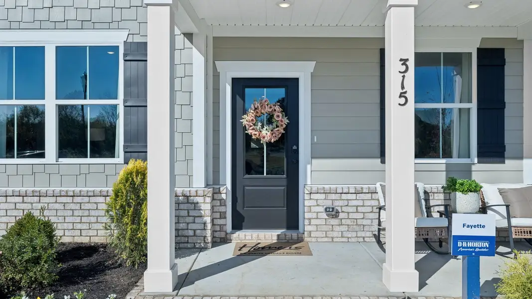 Exterior details and patio area of a home in Harvest Point, Spring Hill (Image 3). Exterior details and patio area of a home in Harvest Point, Spring Hill (Image 3).
