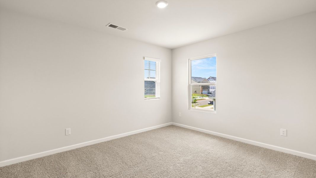 Representative unfurnished interior of a home built from the Elle by D.R. Horton in Preserve at Dove Creek, Statham (Image 27).