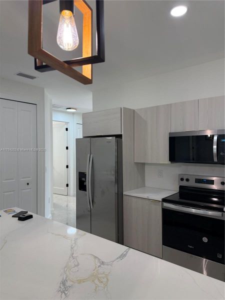 Furnished interior view inside a new home in , Punta Gorda (Image 28).