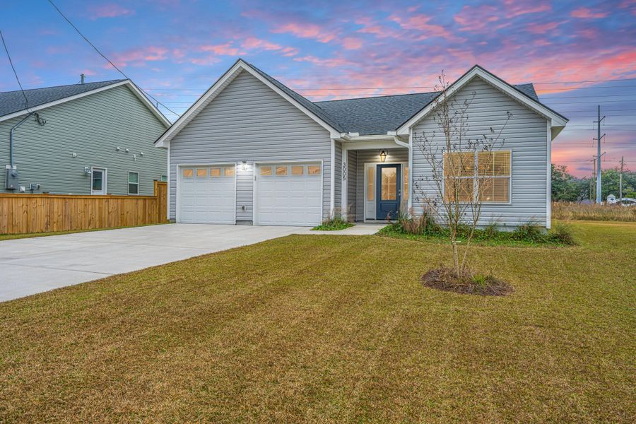 Front exterior of a new home in , North Charleston, SC, highlighting curb appeal (Image 2). Front exterior of a new home in , North Charleston, SC, highlighting curb appeal (Image 2).