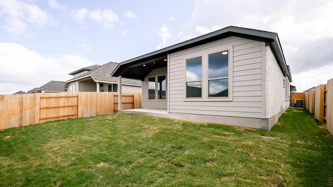 Exterior details and patio area of a home in Crosswinds, Kyle (Image 3).
