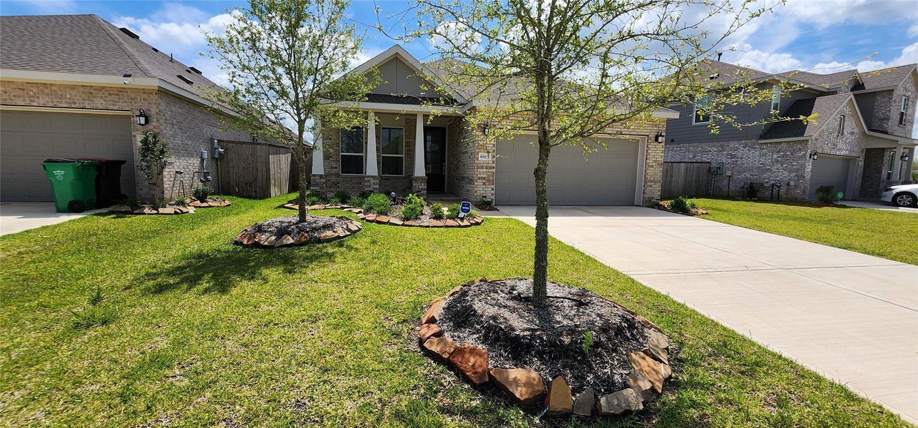 Front exterior of a new home in Anniston, Katy, TX, highlighting curb appeal (Image 2).
