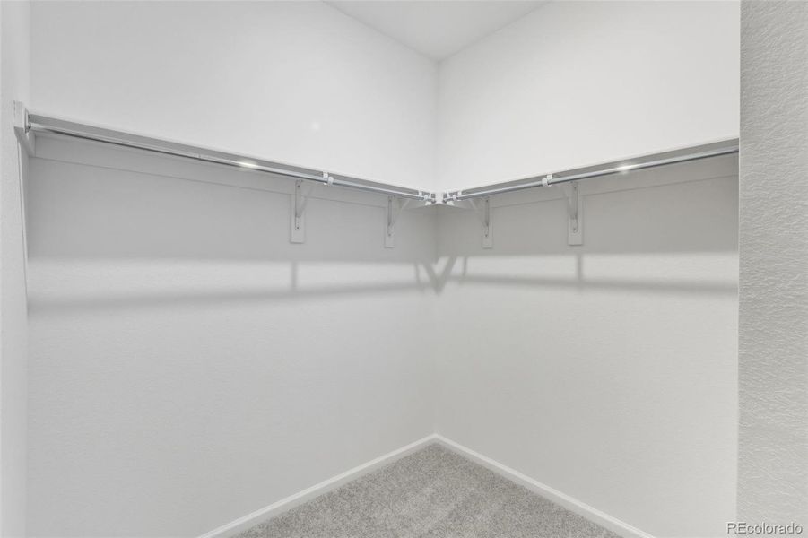 Spacious, unfurnished interior of a new home in The Cottages Collection at Ridgeline Vista, Brighton (Image 14).