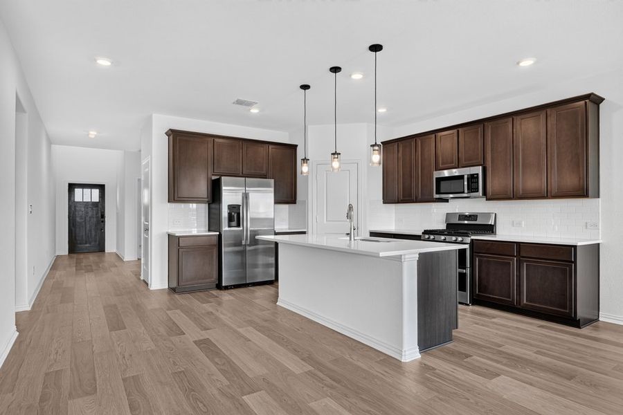 Furnished interior view inside a new home in Parks at Foster Crossing, Anna (Image 6).