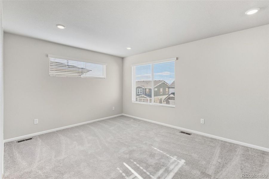 Spacious, unfurnished interior of a new home in Woodrose at Painted Prairie, Aurora (Image 21).