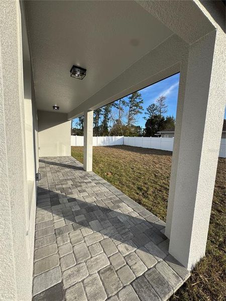 Exterior details and patio area of a home in , Deltona (Image 25).