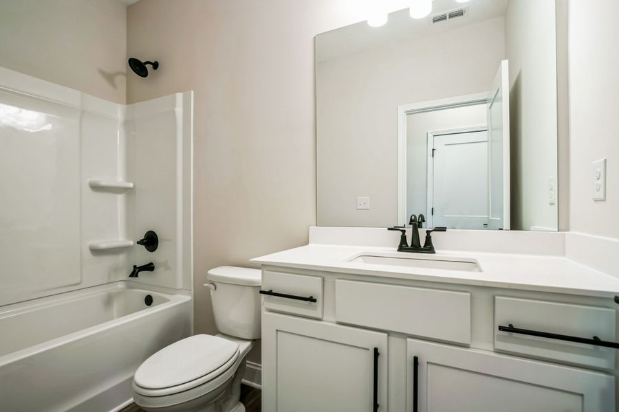 Representative furnished interior of a home built from the Warren by UnionMain Homes in Austin Springs, Bethlehem (Image 6).