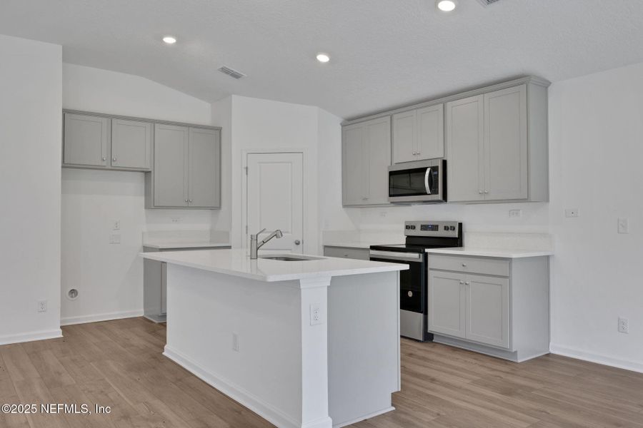 Furnished interior view inside a new home in Wilford Oaks, Orange Park (Image 5). Furnished interior view inside a new home in Wilford Oaks, Orange Park (Image 5).