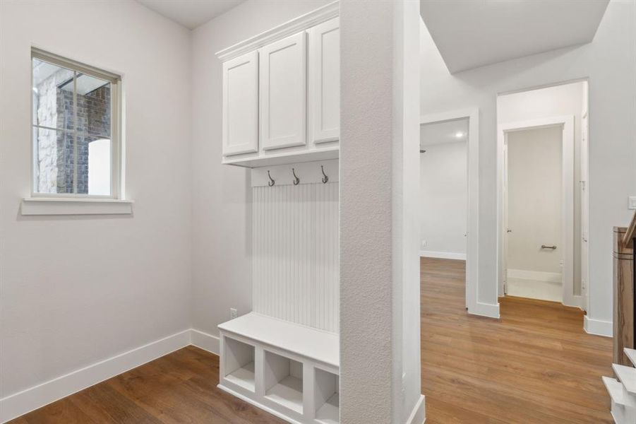 Mudroom featuring hardwood / wood-style floors